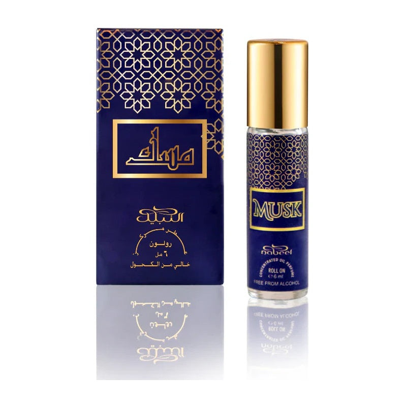 Musk by Nabeel, 6 ml concentrated perfume oil roll-on beside its navy and gold box, on a white studio background